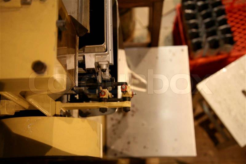 Cropped image of coffee crusher in factory, stock photo