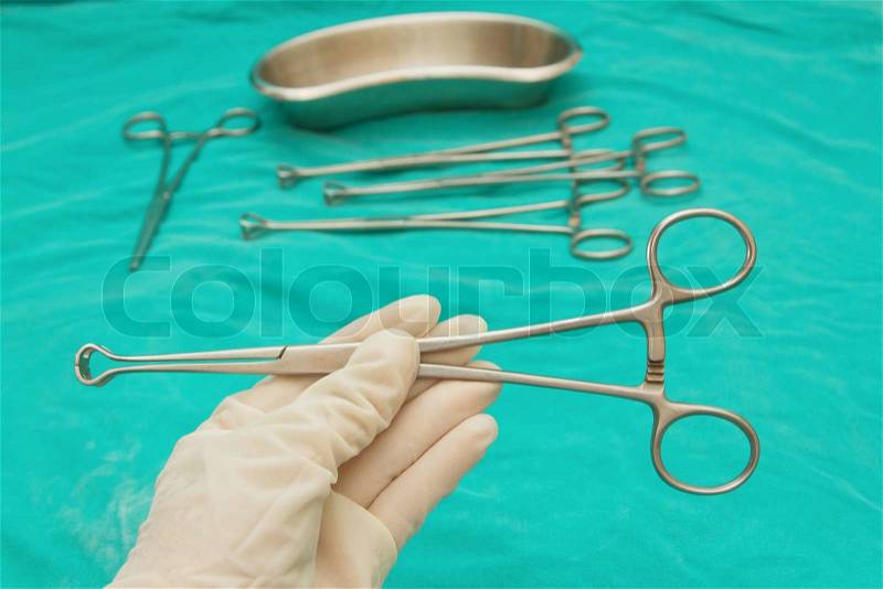 Doctor \'s hand holding the Babcock Forceps ,Surgical Instruments, stock photo
