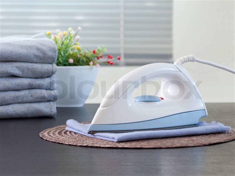 Iron and clothing a home appliance tool, stock photo