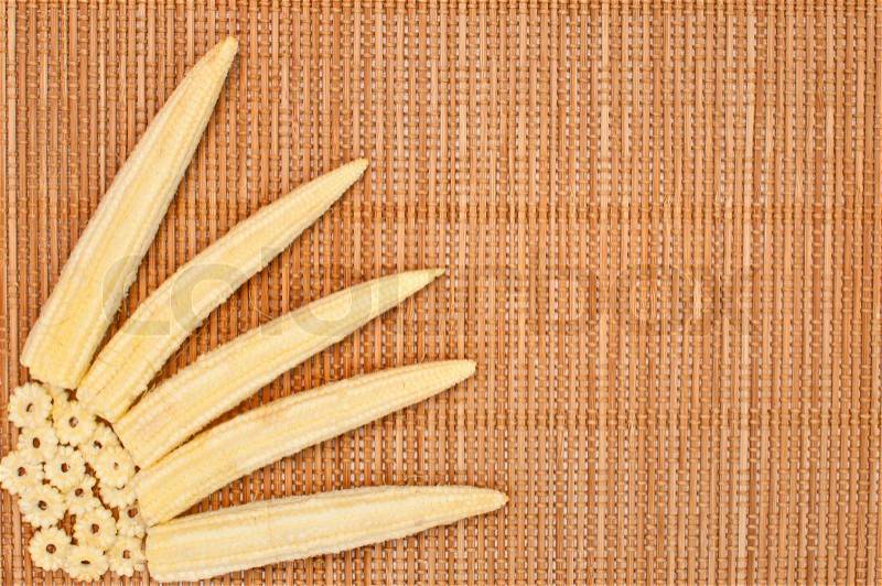 Abstract design background vegetables on a bamboo mat background, stock photo