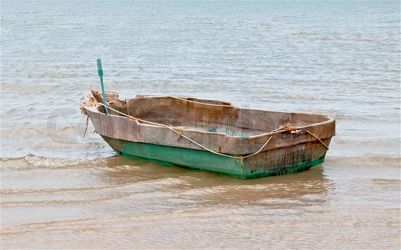 The Old wooden boat on the sea, stock photo