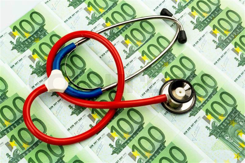 Stethoscope and euro banknotes. symbolic photo for health care costs and health insurance and medical, stock photo