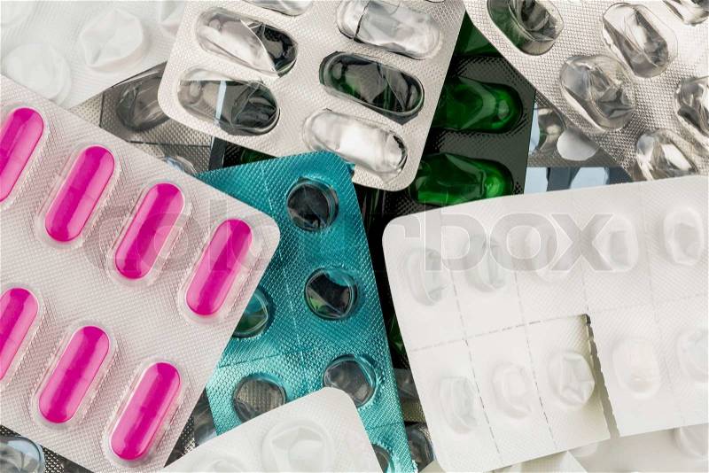 Tablets in blister pack, photo icon for health, medicine and pill addiction, stock photo
