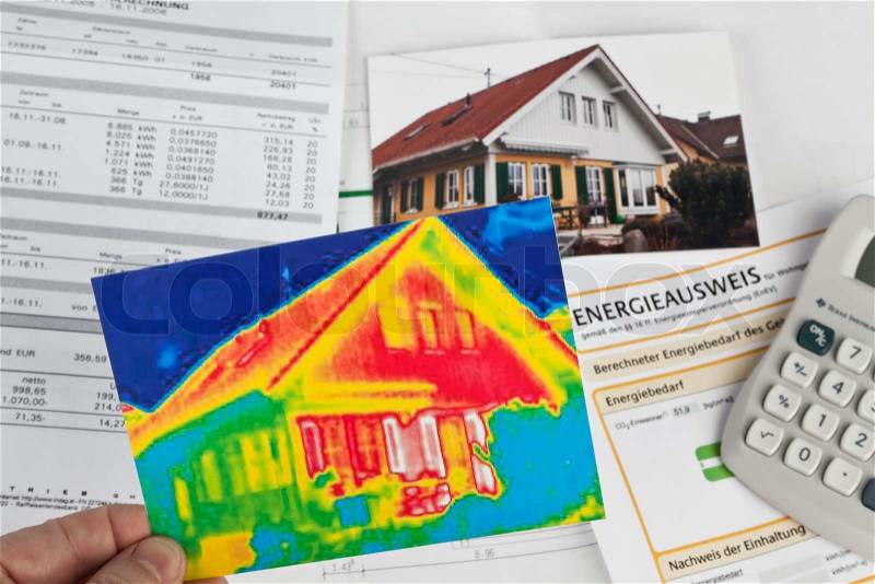 Saving energy through insulation. house with thermal imaging camera photographed, stock photo
