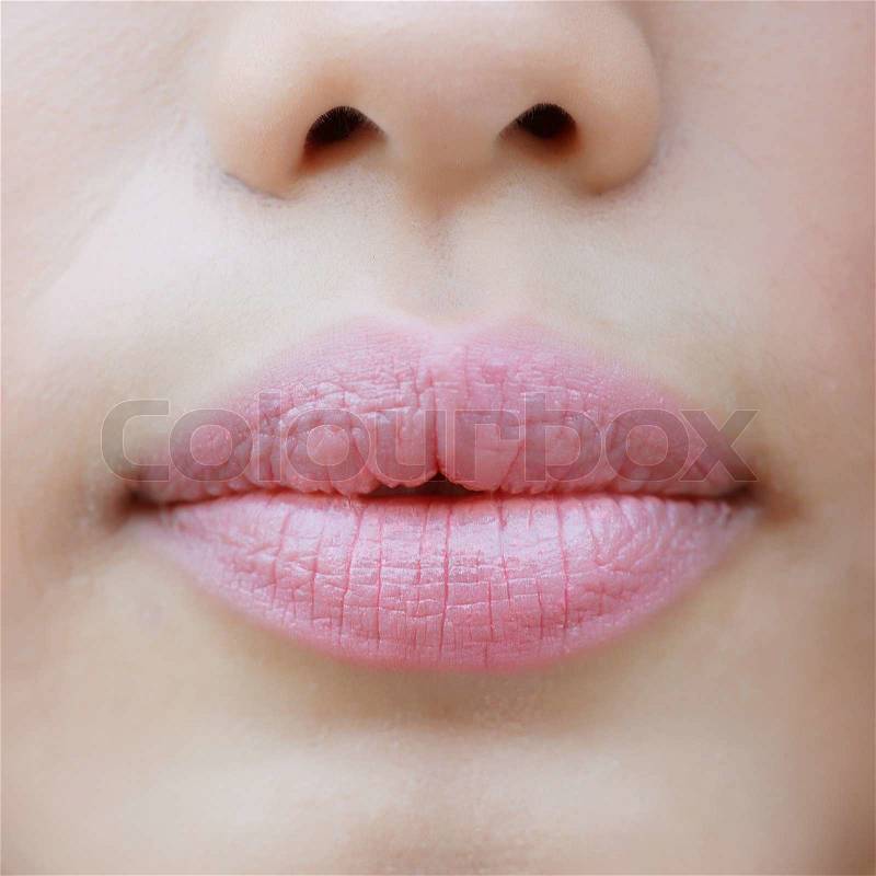 Close up shot detail of the face of a beautiful young women with perfect lips mouth, stock photo