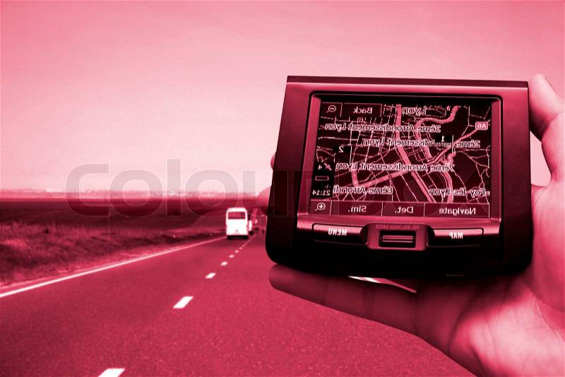 GPS Vehicle navigation system in a man hand. More of this serioes on my portfolio!, stock photo