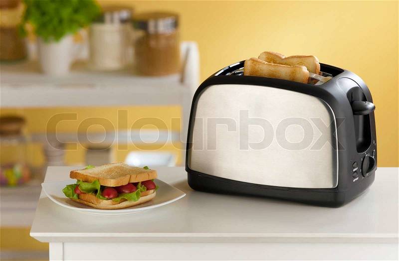 Cute and modern design of the bread toaster great for modern kitchen , stock photo