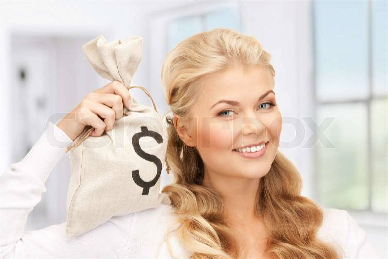 Picture of woman with dollar signed bag, stock photo