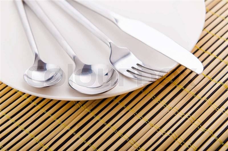 Table setting with knife and fork, stock photo