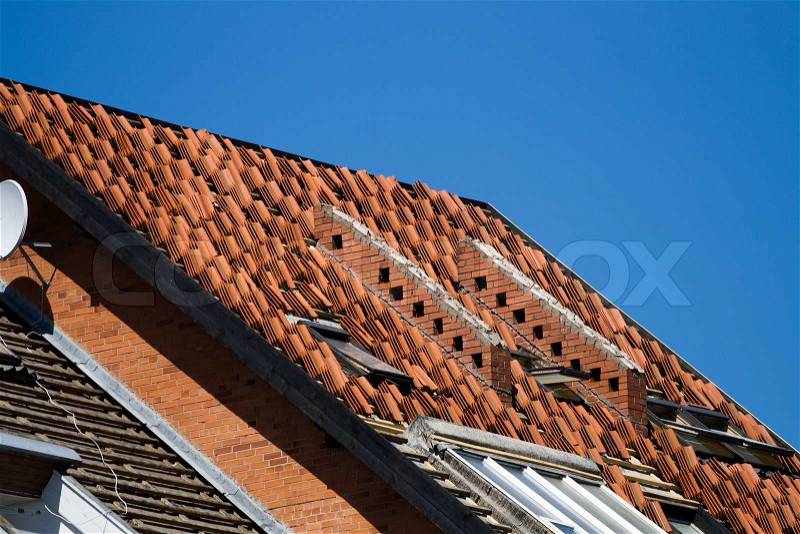 Roof repair or construction work, stock photo