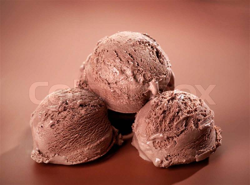 Chocolate Ice cream on brown background, stock photo