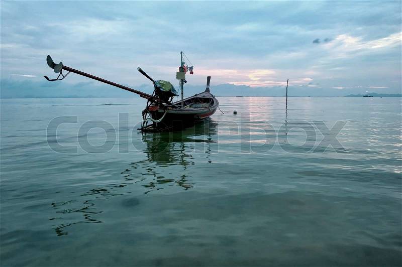 Sea boat art photography. Early morning ocean sunrise, stock photo