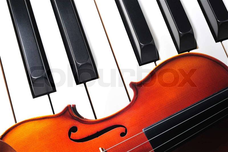 Violin and piano keys, stock photo