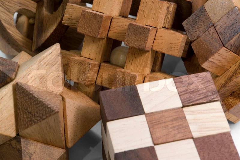 Detail of various wooden 3D puzzles, stock photo