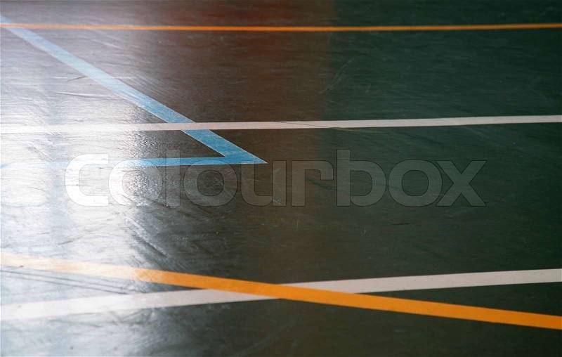 Sport hall shining floor texture with marking lines, stock photo