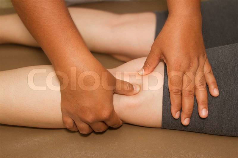 Reflexology leg massage ,spa thai massage, stock photo