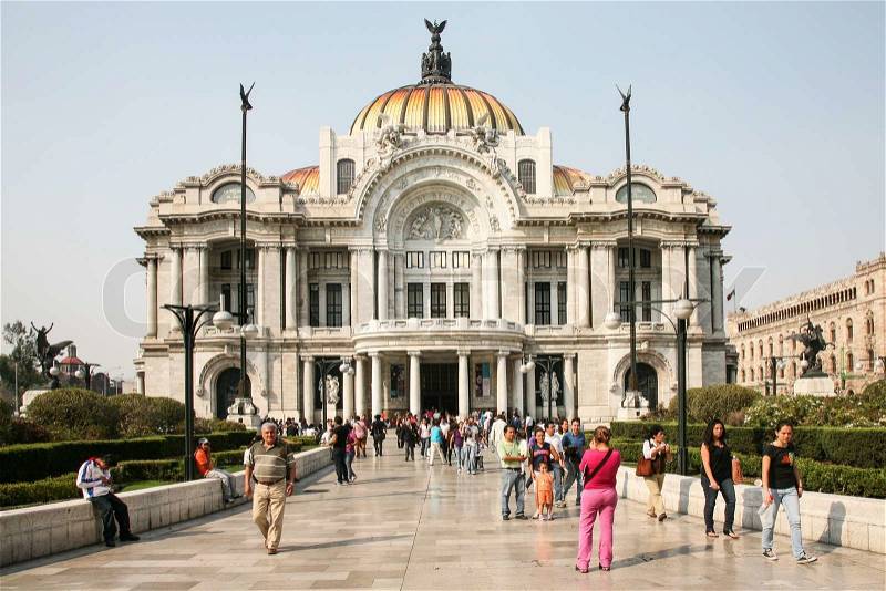 MEXICO CITY, Mexico, -MARCH, 3, 2012: Mexican people passing by the Palacio de Bellas Artes on march 3, 2012 in historical center of Mexico City, Mexico , stock photo