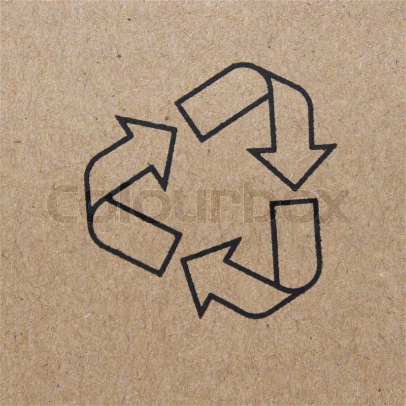 Cardboard box background with recycle symbol, stock photo