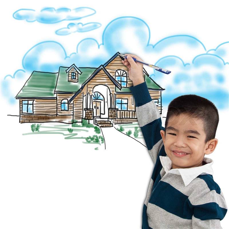 Boy drawing the dream house, stock photo