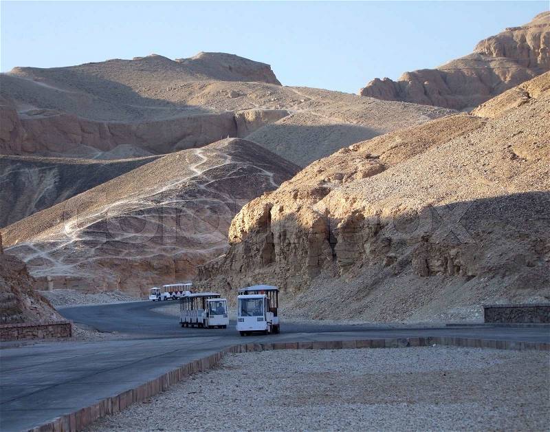 Tourism scenery showing some busses on the way to the Valley of the Kings in Egypt, stock photo