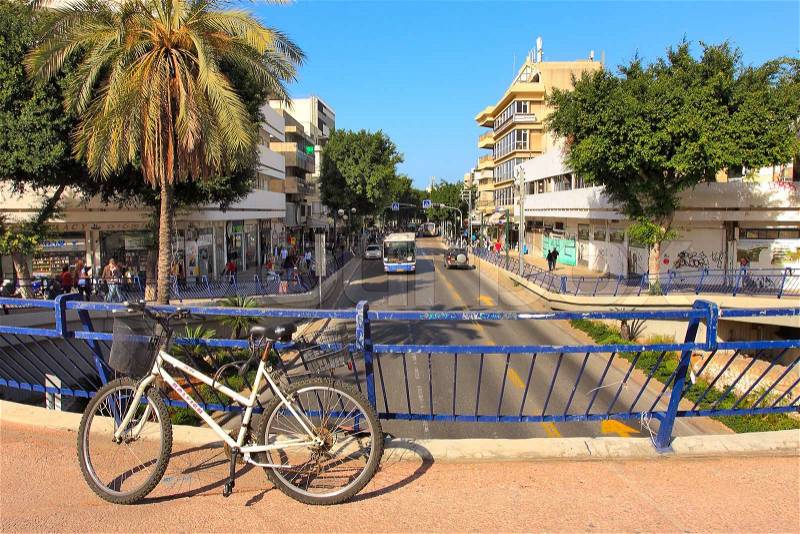 TEL AVIV - JANUARY 29: Bicycle on the bridge over Dizengoff street - major street in central Tel Aviv, named after Tel Aviv\'s first mayor full of coffee shops and clothes stores and is very pupular with tourists and locals in Tel Aviv, Israel on January 2