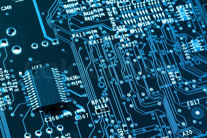 Computer microprocessor on integrated circuit motherboard closeup, stock photo