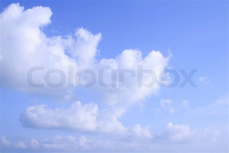 Heart clouds and blue sky background, stock photo