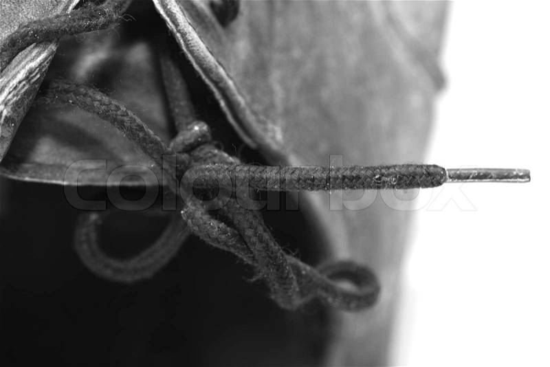 Laces on the old black boots, stock photo