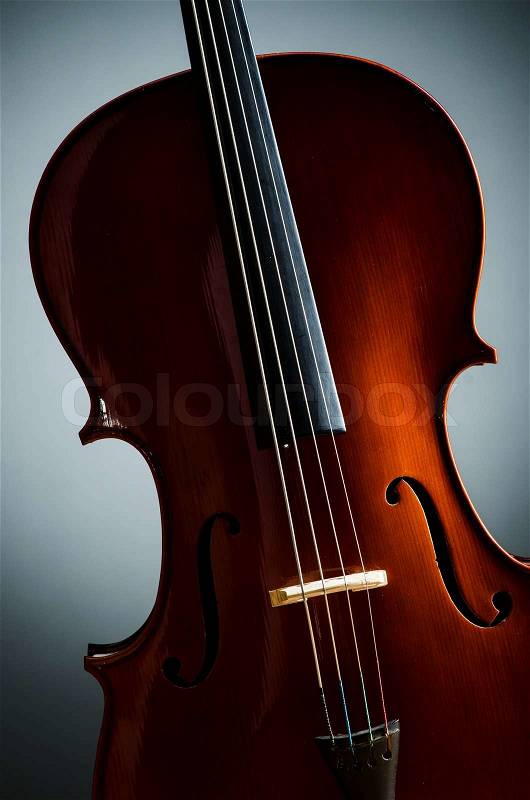 Violin in dark room - music concept, stock photo