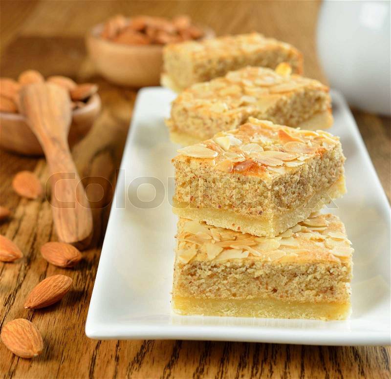 Almond cakes on a brown table, stock photo