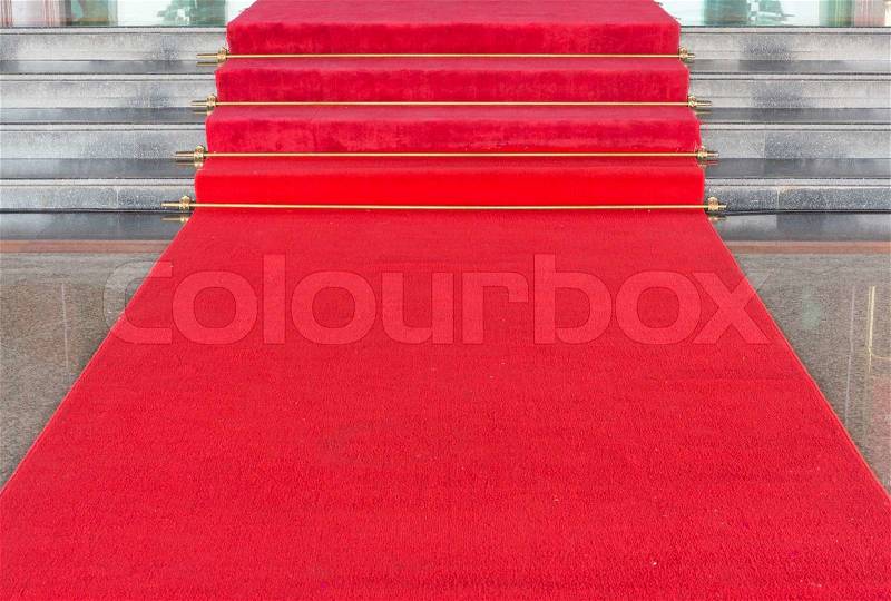 Red carpet on walkway to upstair, stock photo