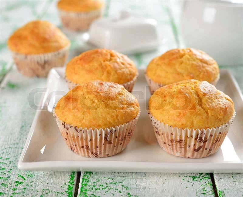 Corn muffins on a white table, stock photo