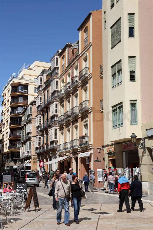 People strolling in the city street Calle Cister in Malaga, Andalusia Spain, stock photo