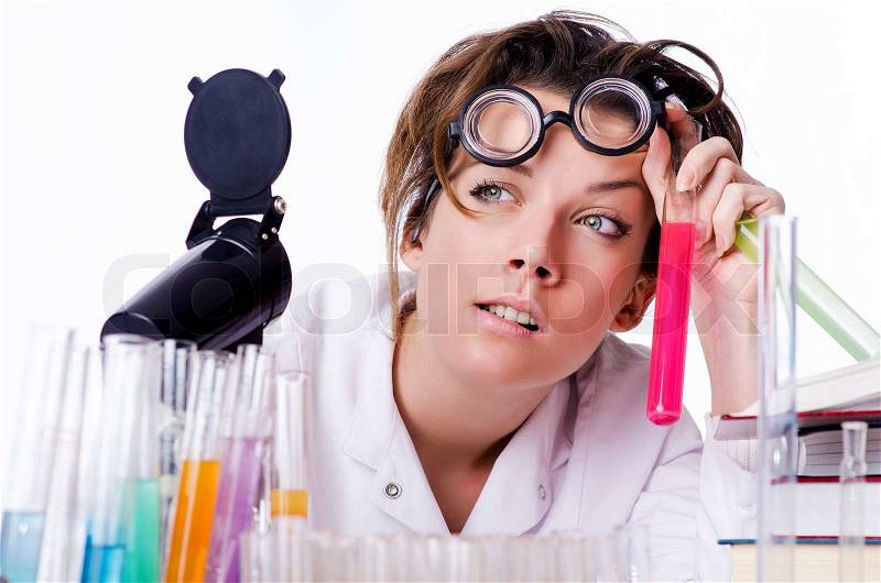 Crazy woman chemist in lab, stock photo