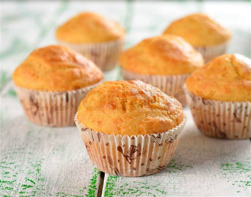 Corn muffins on a white table, stock photo
