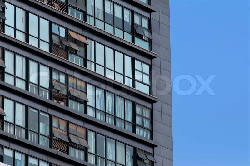 High building window with red dust, stock photo