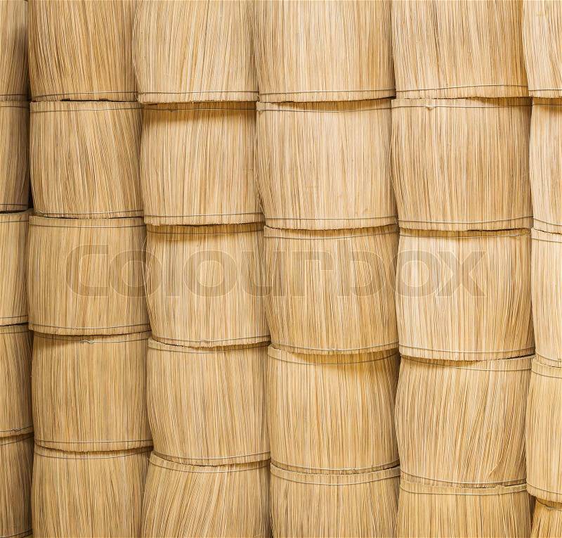 Stacks of sticks bundle for making incense sticks in warehouse, stock photo