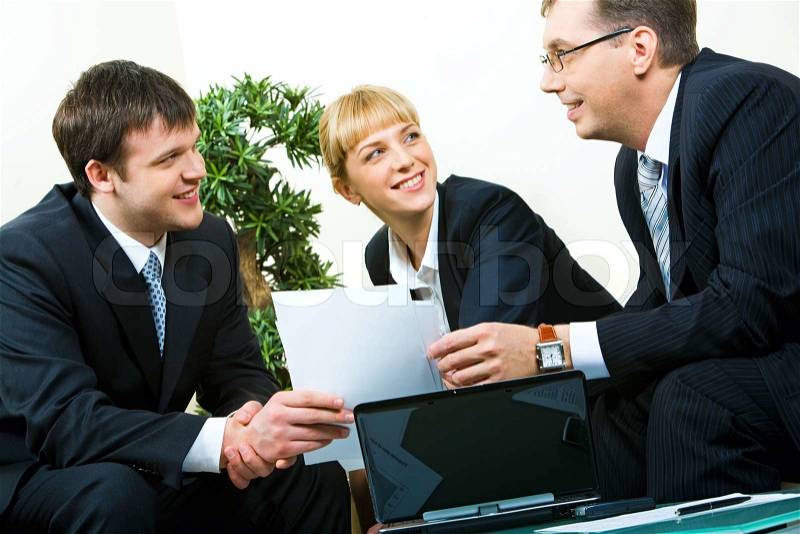 Business man passing the documents to his partner at meeting, stock photo