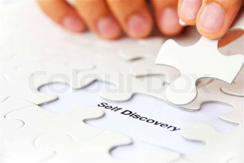 Missing puzzle piece, self discovery concept, stock photo