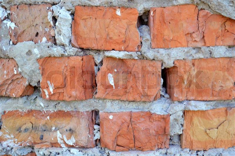 Grunge brick wall with spray paint, stock photo