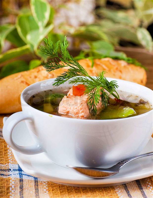 Fish a trout soup and bread with fennel, stock photo