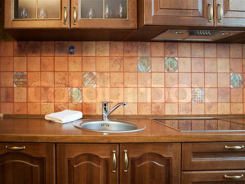 Kitchen Interior With Tiles Wall in Beige, stock photo