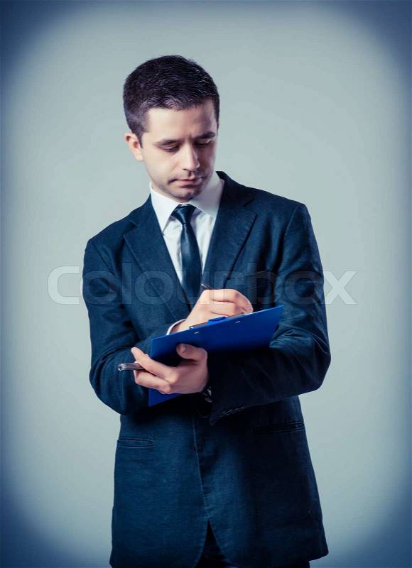 Business man with a clipboard, stock photo