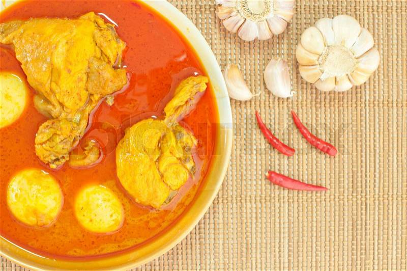 Most delicious spicy Thai food, Chicken curry Mussaman curry on bamboo mat background, stock photo