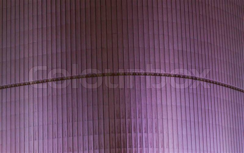 Purple building background with vertical lines pattern, stock photo