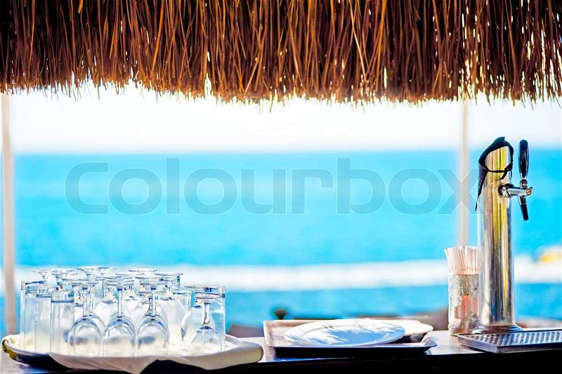 Empty rack bar with sea view, stock photo