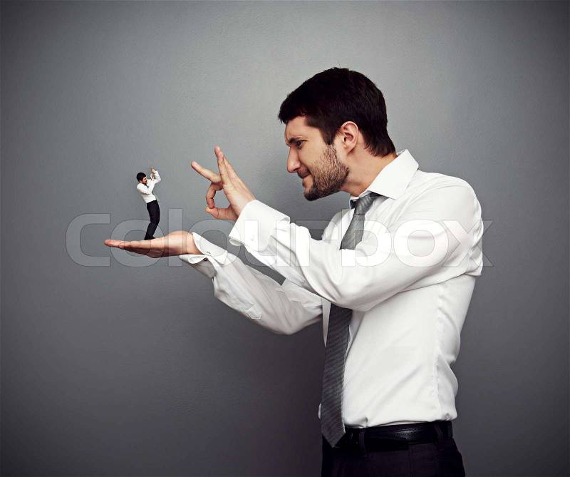Concept photo of wicked boss kicking out of the employer, stock photo