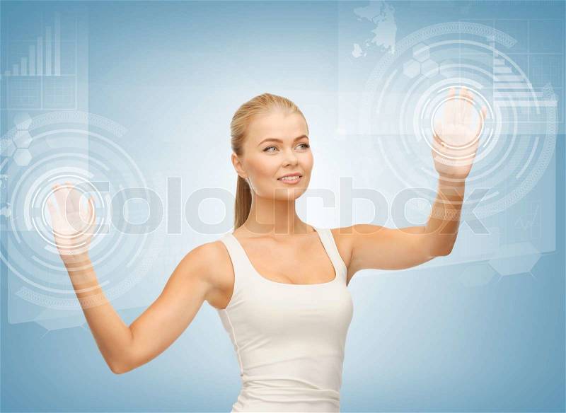 Picture of attractive businesswoman touching virtual screen, stock photo