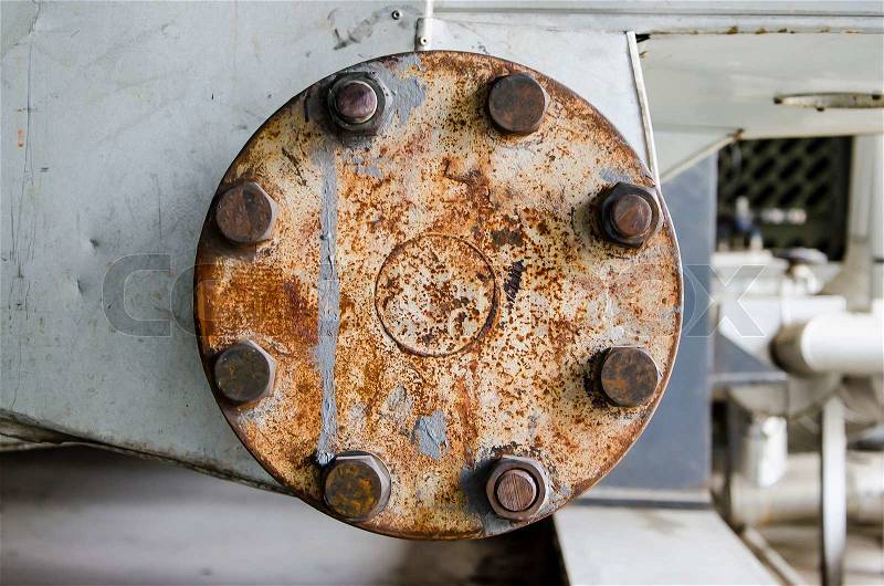 A rusty cast iron pipe flange, stock photo