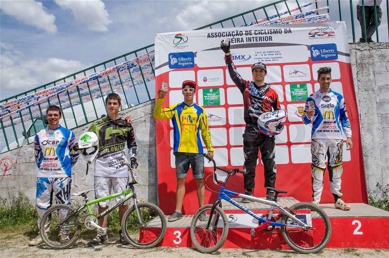 CASTELO BRANCO, PORTUGAL - MAY 5: Juniors Elite podium at the 3rd stage of the Luso-Spanish BMX race Trophy the on may 5, 2013 in Castelo Branco, Portugal, stock photo
